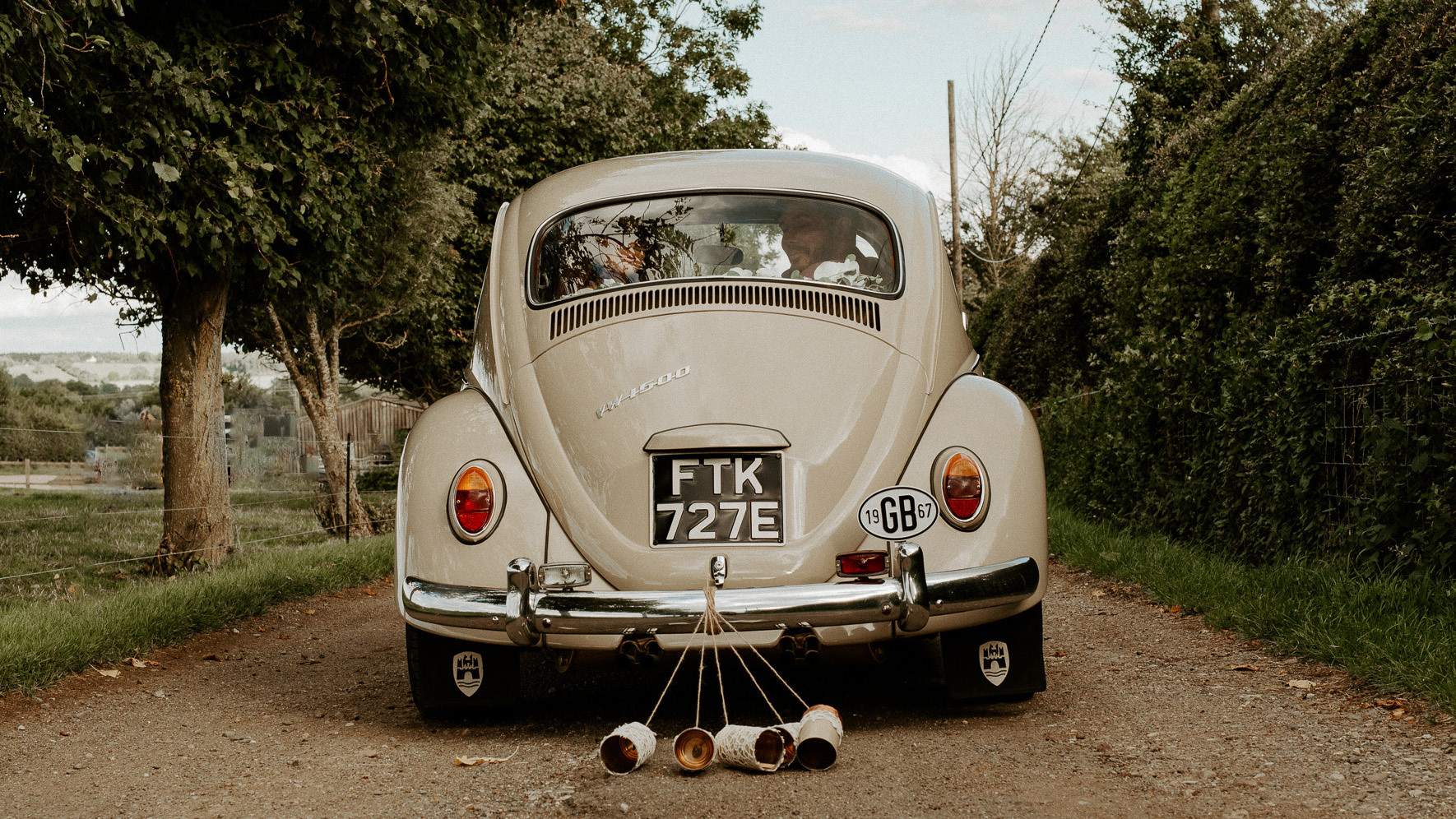 Classic Beetle Rear view with Tins and Cans Wedding Decoration