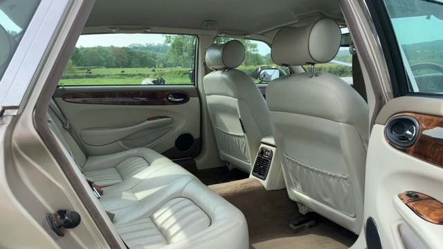 Jaguar XJ Sovereign LWB cream leather interior seats 4 passengers