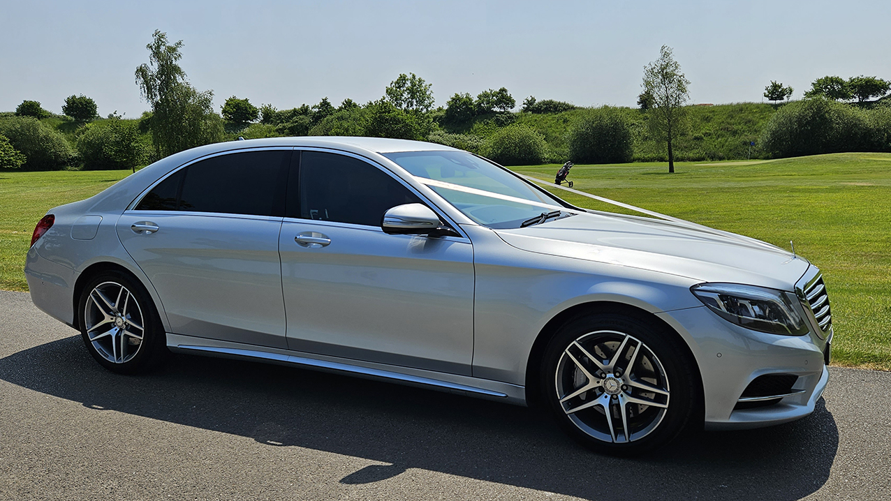 Mercedes s-Class side view with White Weddiibbons