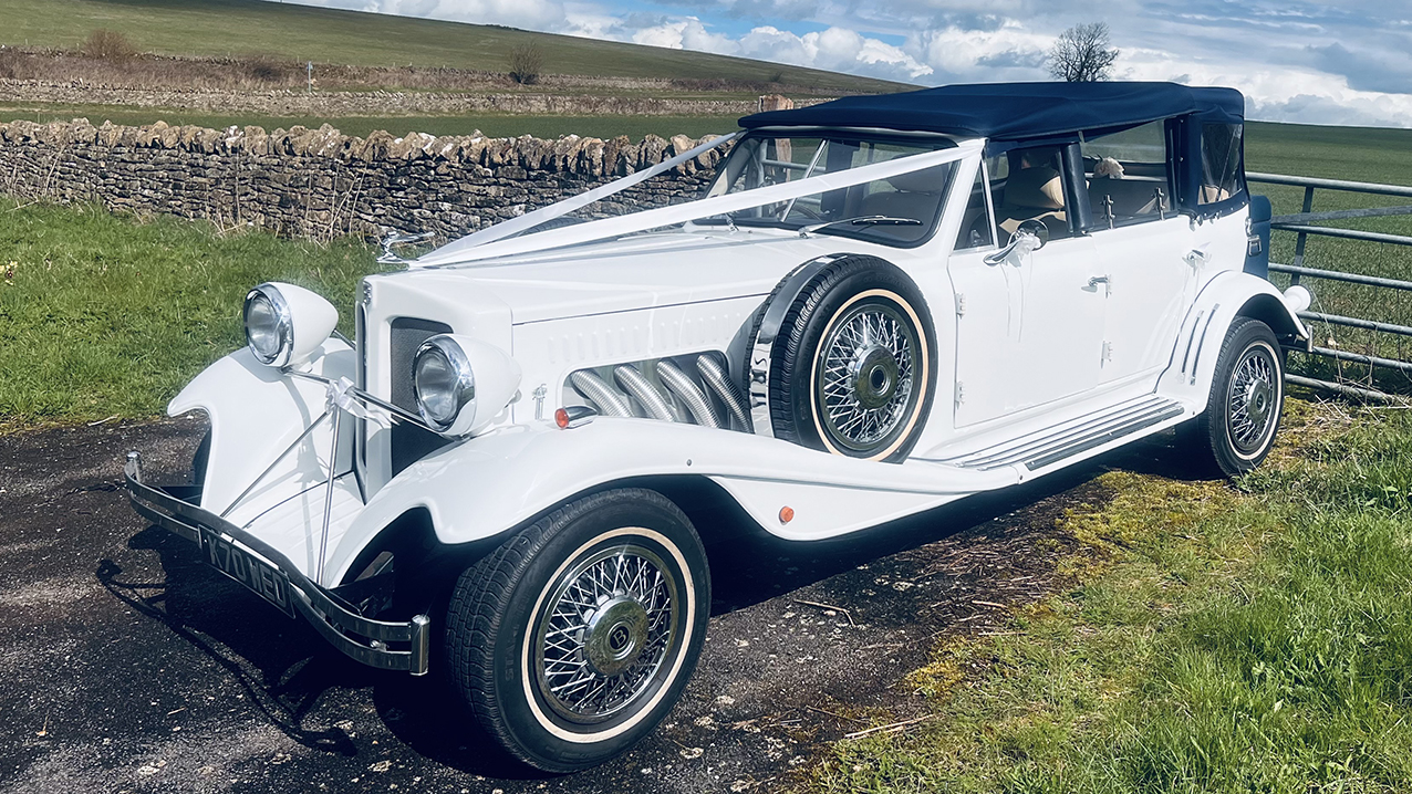 White Vintage Beauford with Roof close