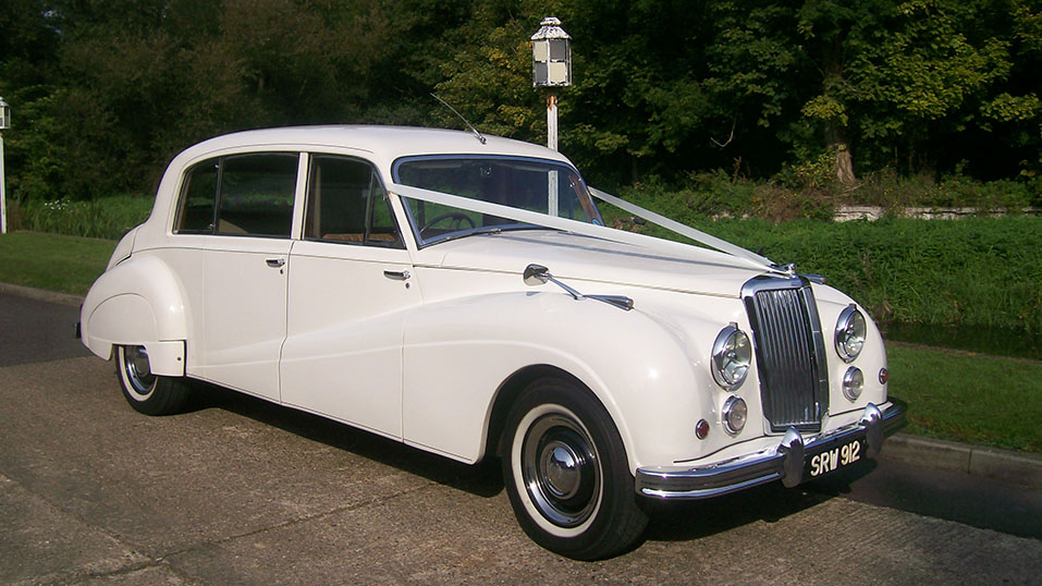 Armstrong-Siddeley Limousine in white with forest background