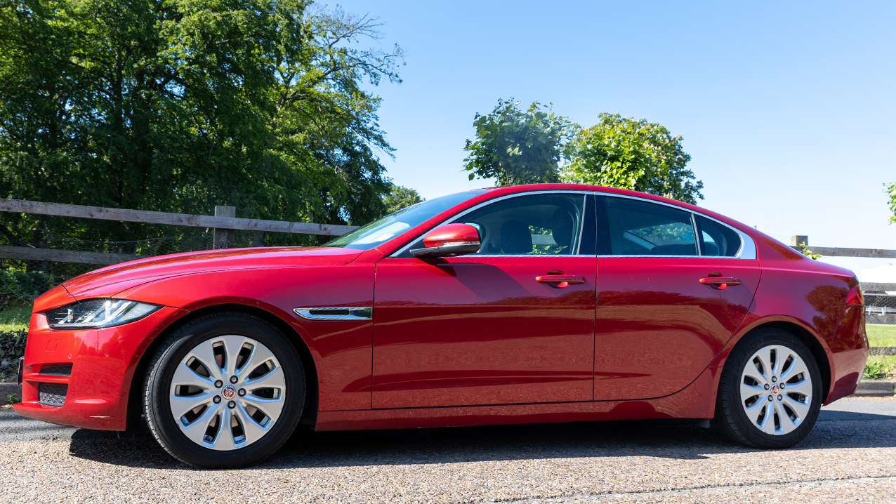Modern Red Jaguar left side view