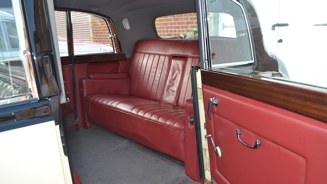 Armstrong-Siddeley Limousine rear seating with casual seats down. Large space for bride's wedding dress