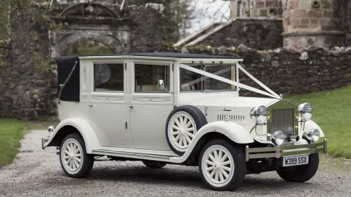 Vintage Imperial Convertible in Cream with Traditional V-Shape White Ribbons in Midlothian.
