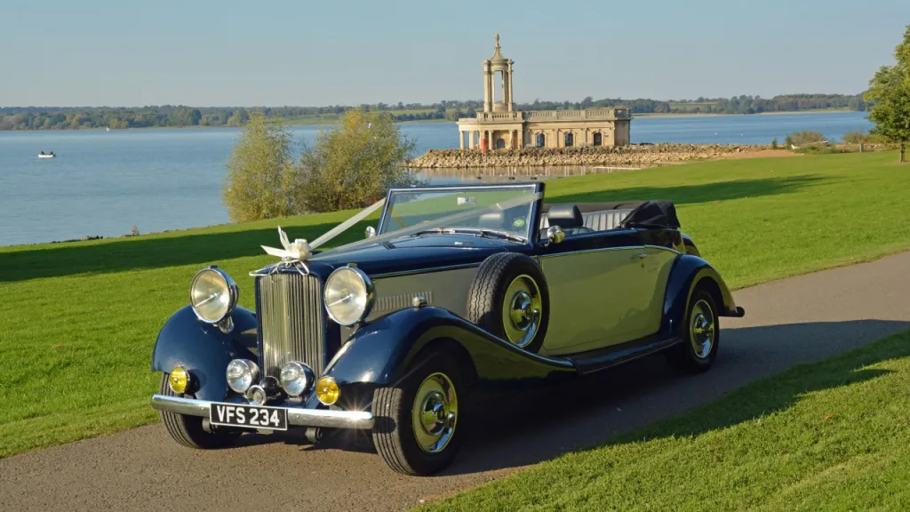 Blue & Ivory Convertible Royale with roof open