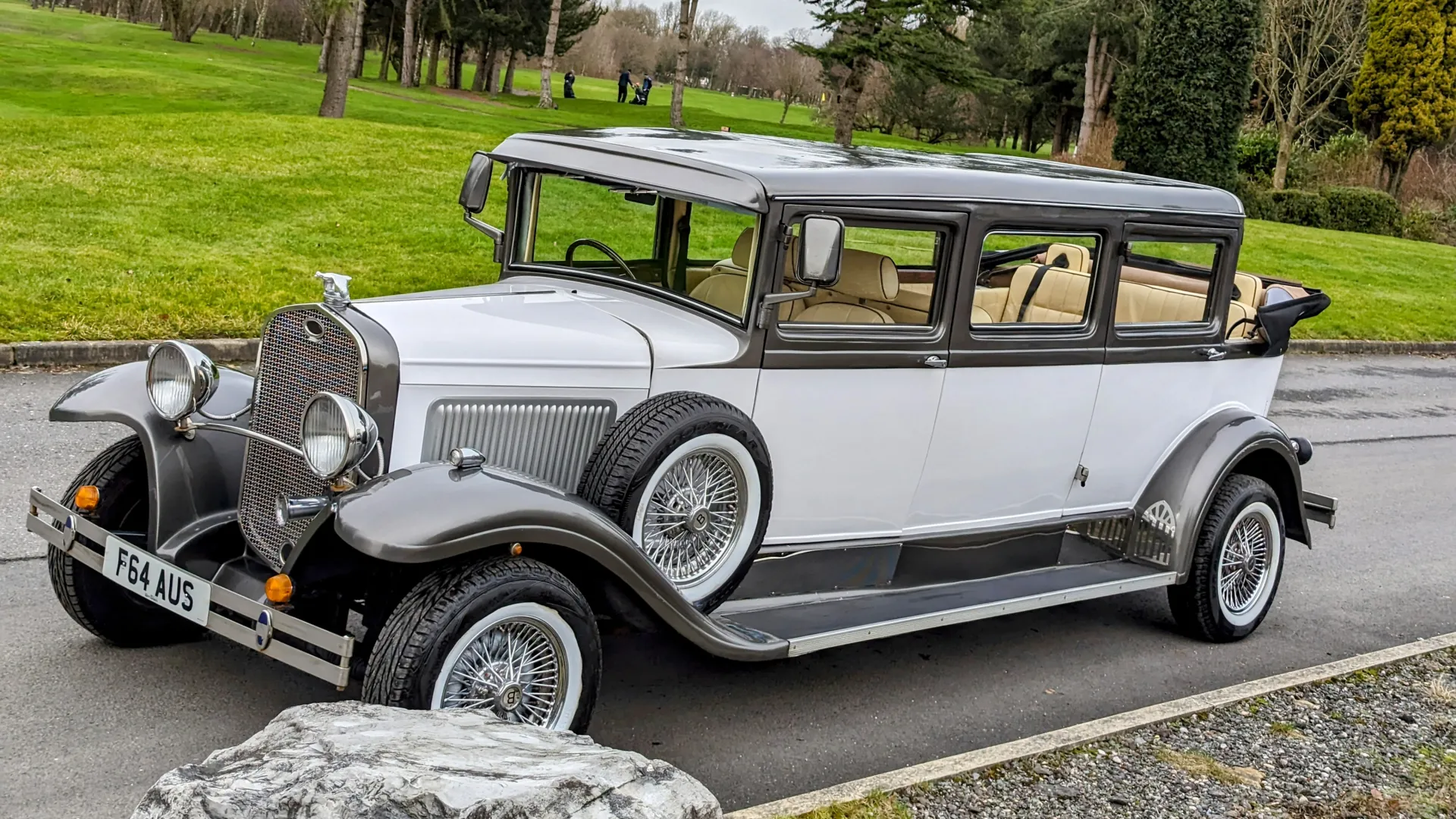 7-seater bramwith convertible with roof open showing the cream leather interior