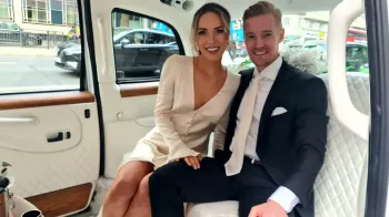 Bride and Groom inside Modern Taxi Cab with Cream Leather interior