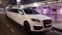 Front view of Audi Limousine showing the big Black Alloy wheels