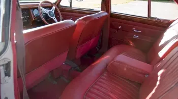 Cherry Red Leather Rear interior of Classic showing the large rear bench seat and ample leg room