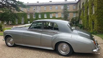 Rear side view showing the two-tone silver colour. Darker Silver is used for the top half of the vehicle across to its bonnet