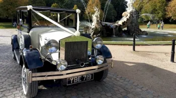 Front view of imperial Viscount car decorated with white ribbons