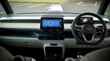 Inside photo of the front of the vehicle showing the dashbord of an electric VW ID Buzz Campervan.