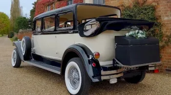 Rear view of the Bramwith with Black roof down and picnic trunk at the rear of the vehicle