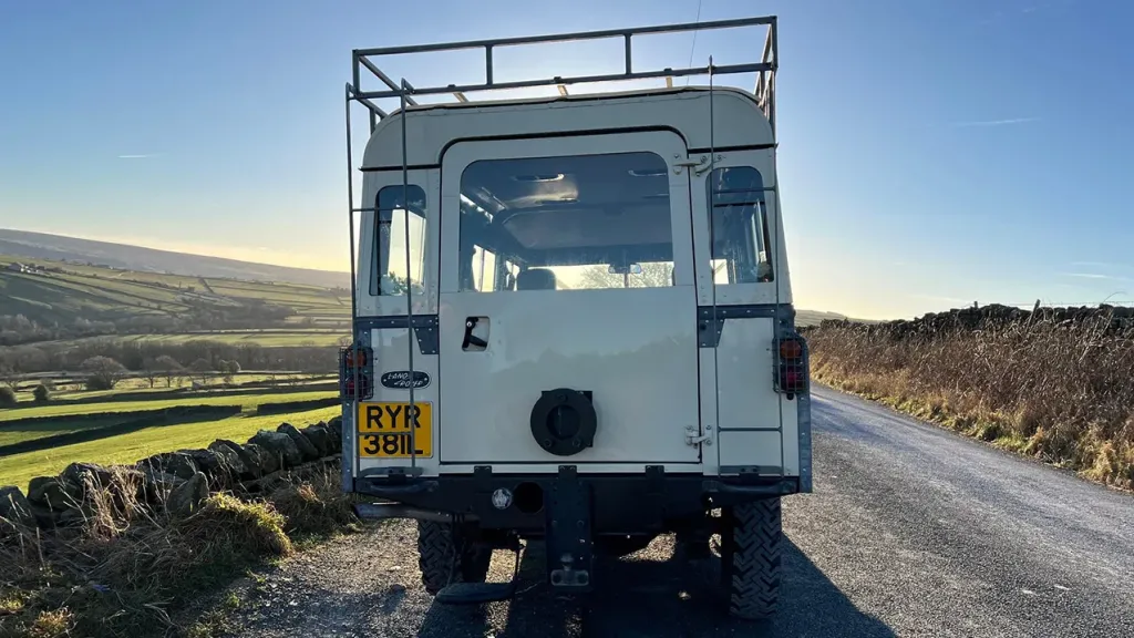 Rear of Classic land Rover showing lare access door to rear seating area
