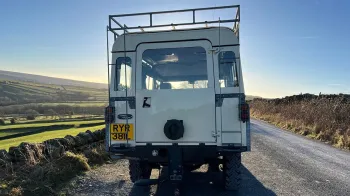 Rear of Classic land Rover showing lare access door to rear seating area