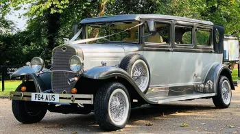 Front view of Vintage Bramwith decorated with Ribbons, chrome front grill and large chrome mounted headlights