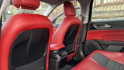 INterior photos shwing large ledroom in a sporty Alfa Romeo Giulia