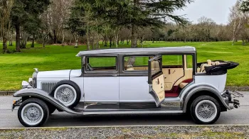 External Left view of the vintage bramwith car with roof open and rear passenger door open showing large and spacious entrance