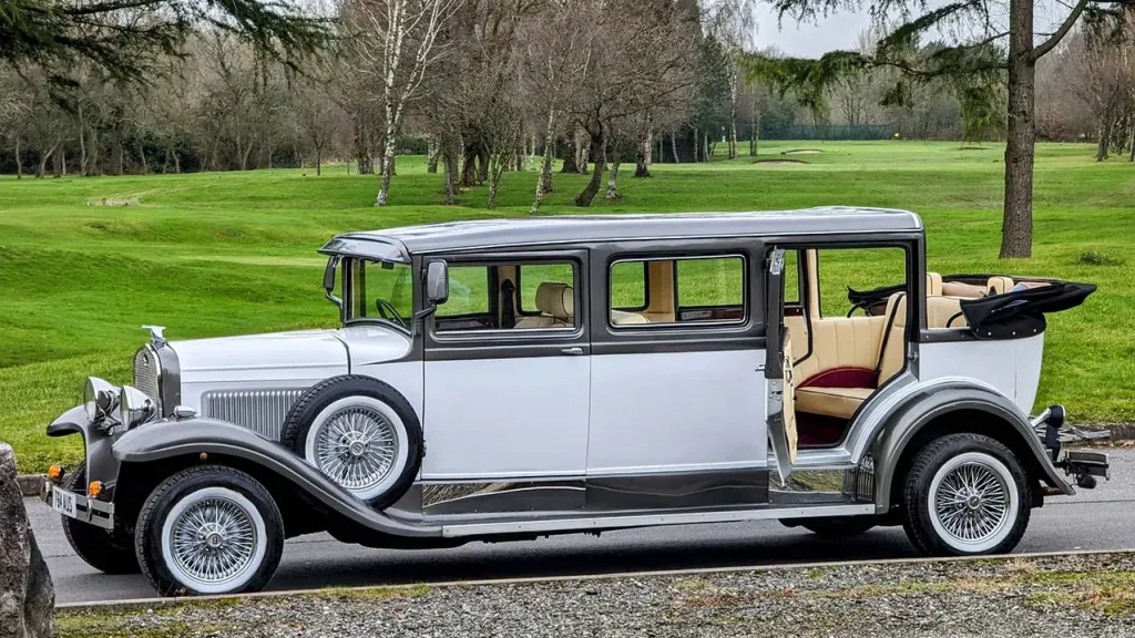 External Left view of the vintage bramwith car with roof open and rear passenger door open showing large and spacious entrance