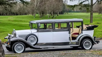 External Left view of the vintage bramwith car with roof open and rear passenger door open showing large and spacious entrance