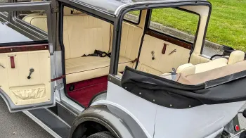 Close up view of the rear passenger entrance opened door access