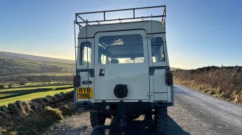 Rear of Classic land Rover showing lare access door to rear seating area
