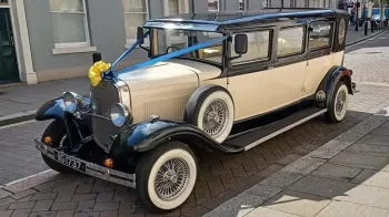 Side view of Vintage Bramwith in Ivory with Black wheel arches.