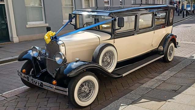 Side view of Vintage Bramwith in Ivory with Black wheel arches.