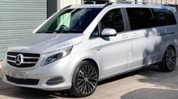 Side view of 6-seater Silver Mercedes