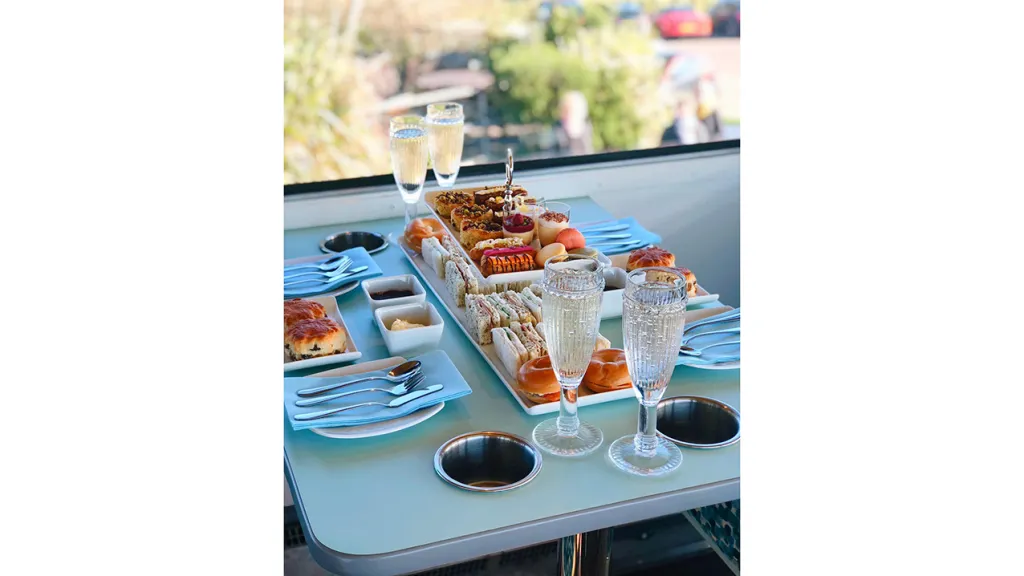 Table set for Afternoon Tea in the Routemaster bus.