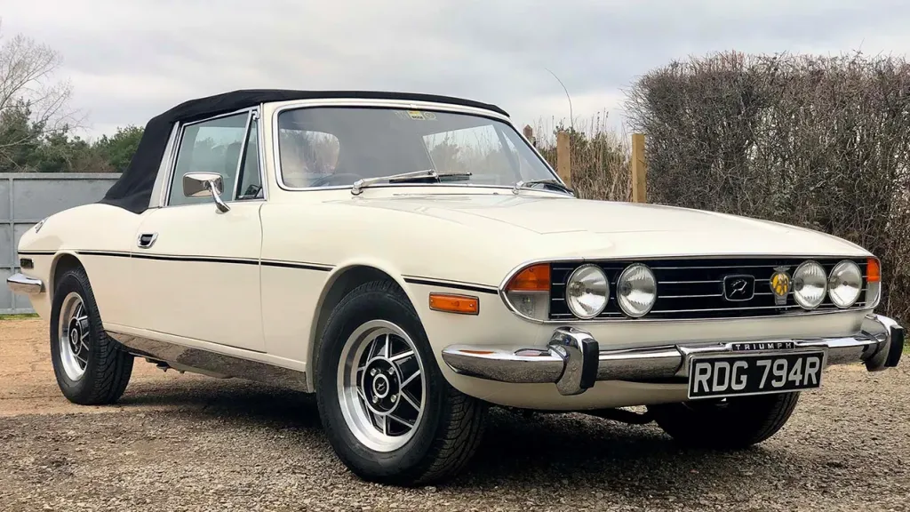 Front Side view of the Classic Stag with convertible black soft top up
