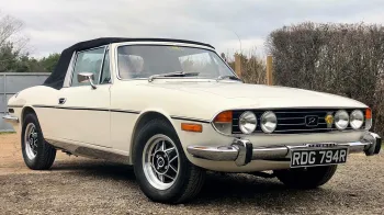 Front Side view of the Classic Stag with convertible black soft top up