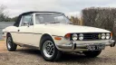 Front Side view of the Classic Stag with convertible black soft top up