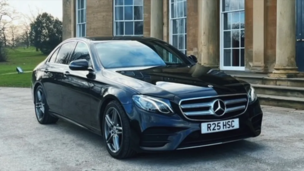 Front left View of Black Mercedes in front of wedding venue in Yorkshire