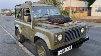 Military Landrover side view without any wedding decoration