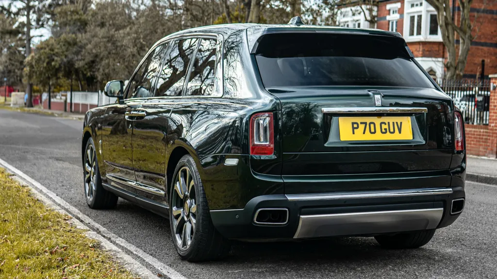 Rear Left View of Dark Green Rollslls-Royce Cullinan