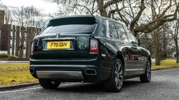 Rear Right View of Dark Green Rollslls-Royce Cullinan