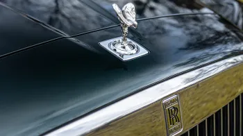 Spirit of Ecstasy on top of the Chrome Rolls-Royce Grill