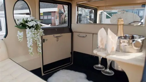 Cream interior inside the Bramwith, wedding flower decoration and champagne flute