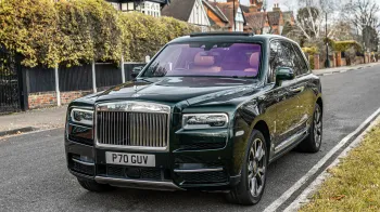 Dark Green Rolls-Royce cullinan left front view