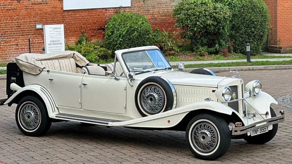 right side of Convertible Beauford with Roof down, spare wheel mounted on the side of the vehicle