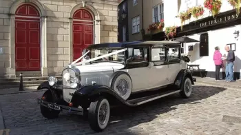 Front Side view of Vintage Bramwith convertible with White Ribbons
