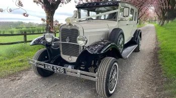 Front Side view of vintage bramwith in Ivory with Black wheels arches