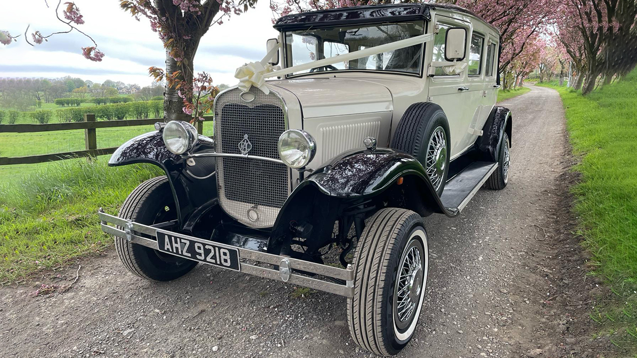 Front Side view of vintage bramwith in Ivory with Black wheels arches
