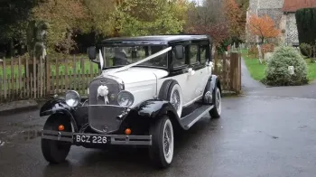 Front Side view of Vintage Bramwith convertible with White Ribbons