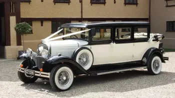 Front Side view of Vintage Bramwith convertiblewith White Ribbons