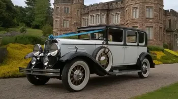Vintage Franklin dressed with Turquoise blue ribbons in front of wedding venue