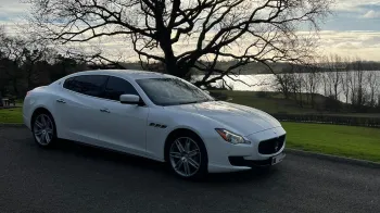 Front right side of white maserati