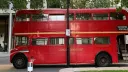Left side view of Red Routemaster bus in Street of London