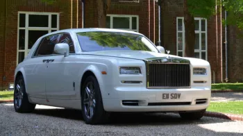 Right side view of White rolls-Royce Phantom Series 2